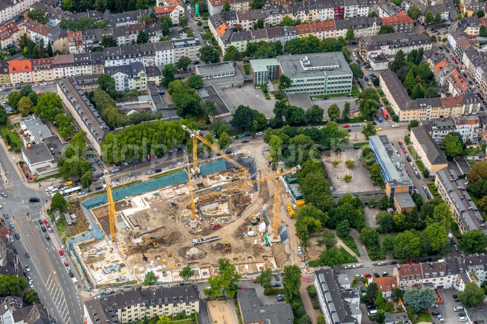 Essen from the bird's eye view: Construction site to build a new multi-family residential complex a?? Cranachhoefe a?? of Allbau AG in Essen in the state North Rhine-Westphalia, Germany