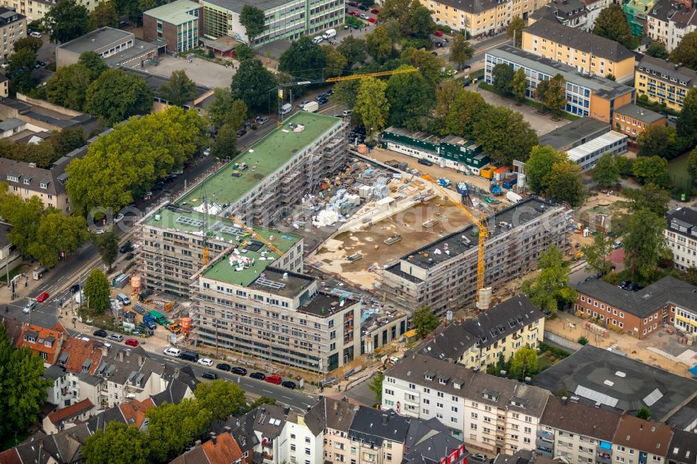 Essen from the bird's eye view: Construction site to build a new multi-family residential complex Cranachhoefe in Essen in the state North Rhine-Westphalia, Germany