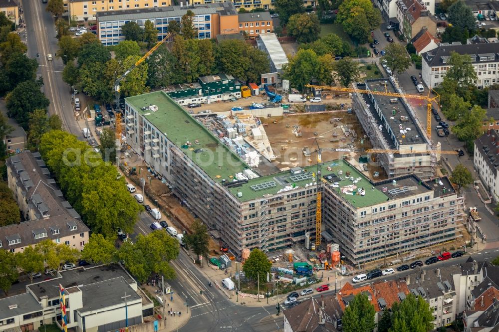 Essen from the bird's eye view: Construction site to build a new multi-family residential complex Cranachhoefe in Essen in the state North Rhine-Westphalia, Germany