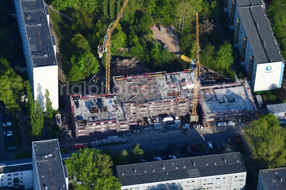 Berlin from the bird's eye view: Construction site to build a new multi-family residential complex of degewo AG on Wuhlestrasse in the district Biesdorf in Berlin, Germany