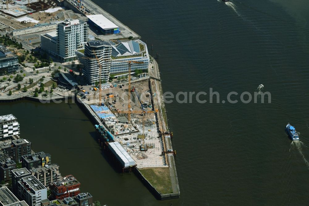 Aerial photograph Hamburg - Construction site to build a new multi-family residential complex of DC DEVELOPMENTS GMBH & CO. KG on Strandkai in the district HafenCity in Hamburg, Germany