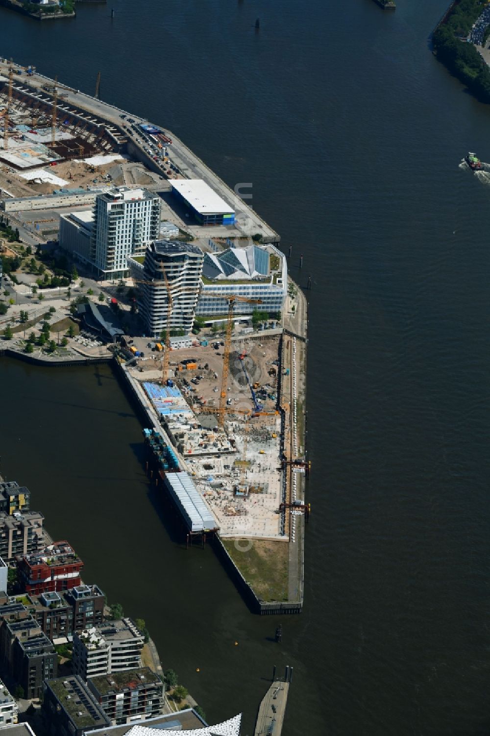 Hamburg from above - Construction site to build a new multi-family residential complex of DC DEVELOPMENTS GMBH & CO. KG on Strandkai in the district HafenCity in Hamburg, Germany