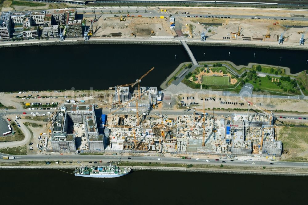 Aerial photograph Hamburg - Construction site to build a new multi-family residential complex of DC DEVELOPMENTS GMBH & CO. KG on Strandkai in the district HafenCity in Hamburg, Germany