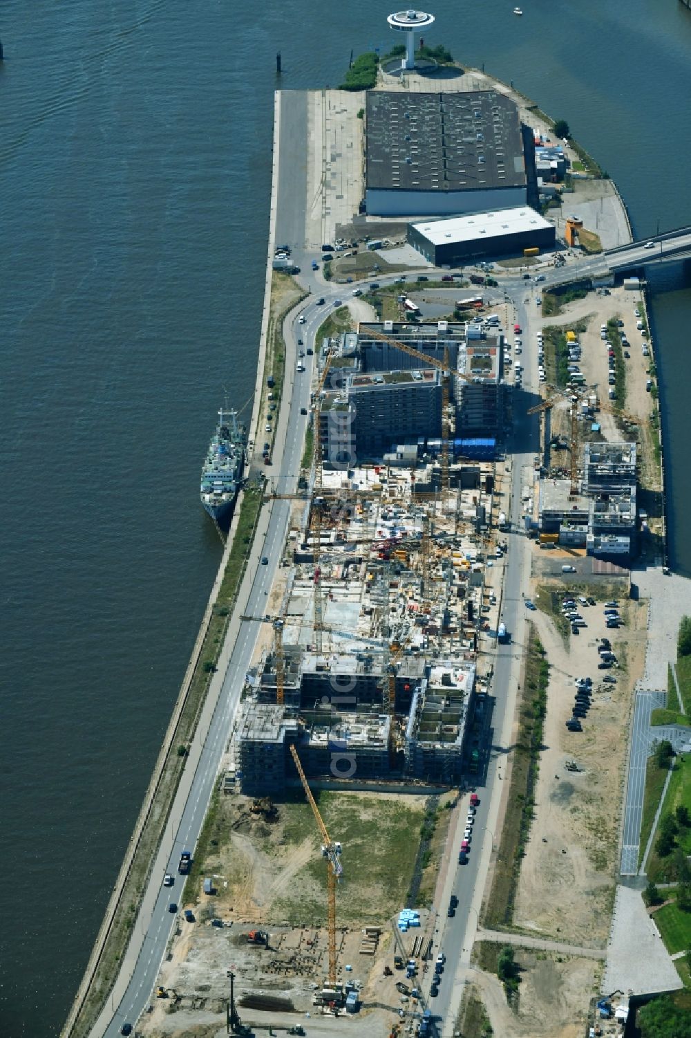 Hamburg from above - Construction site to build a new multi-family residential complex of DC DEVELOPMENTS GMBH & CO. KG on Strandkai in the district HafenCity in Hamburg, Germany