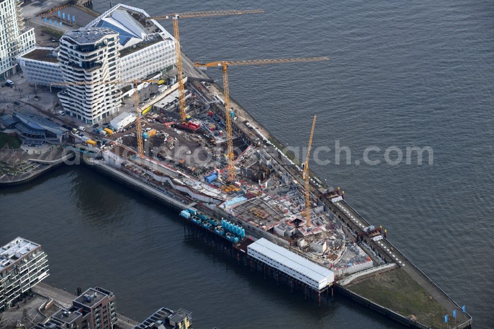 Hamburg from above - Construction site to build a new multi-family residential complex of DC DEVELOPMENTS GMBH & CO. KG on Strandkai in the district HafenCity in Hamburg, Germany