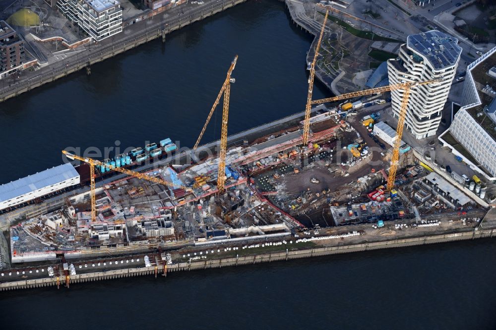 Hamburg from above - Construction site to build a new multi-family residential complex of DC DEVELOPMENTS GMBH & CO. KG on Strandkai in the district HafenCity in Hamburg, Germany