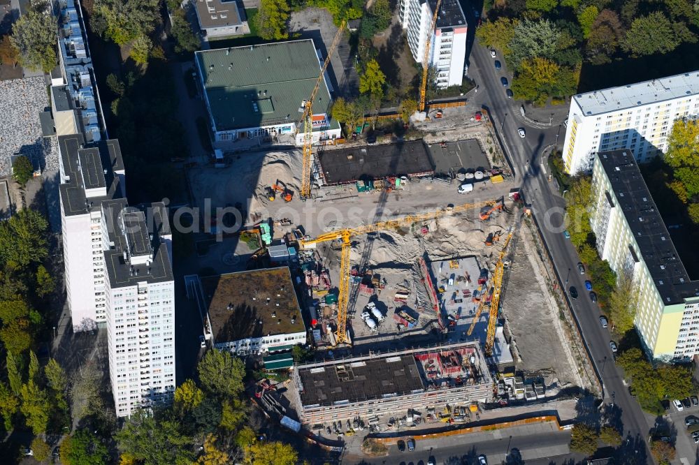 Berlin from the bird's eye view: Construction site to build a new multi-family residential complex Dolgensee-Center on Dolgenseestrasse in the district Lichtenberg in Berlin, Germany