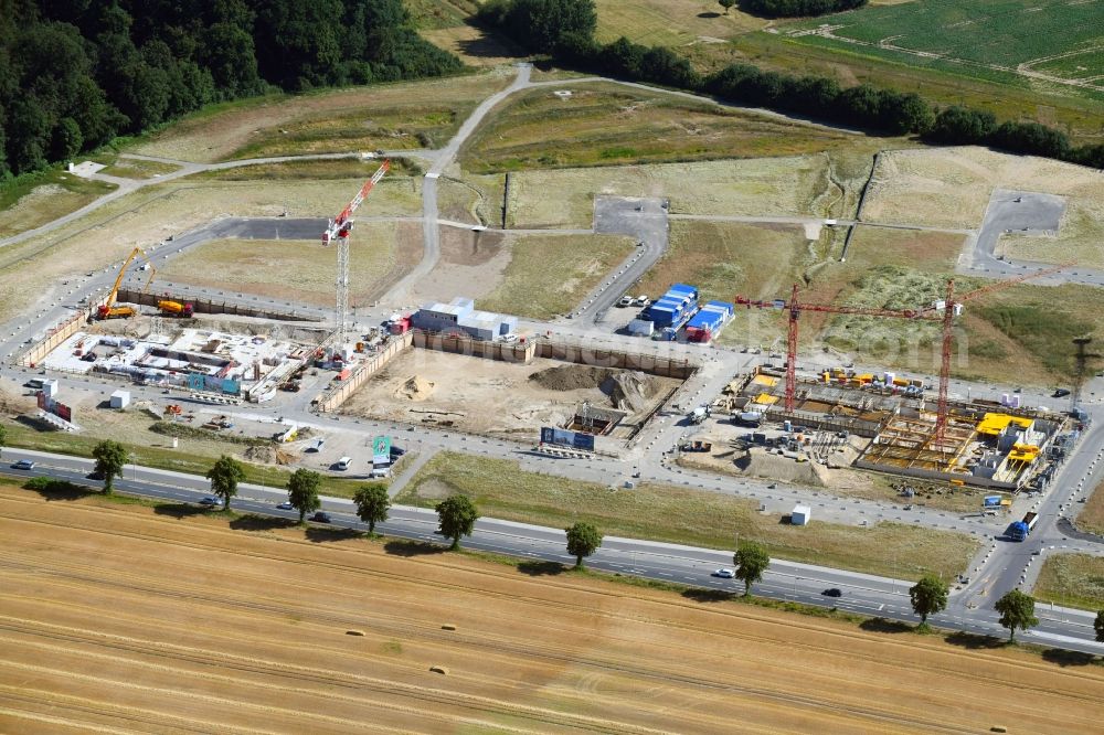 Wolfsburg from the bird's eye view: Construction site to build a new multi-family residential complex Drei Gaerten of Justus Grosse GmbH in Wolfsburg in the state Lower Saxony, Germany