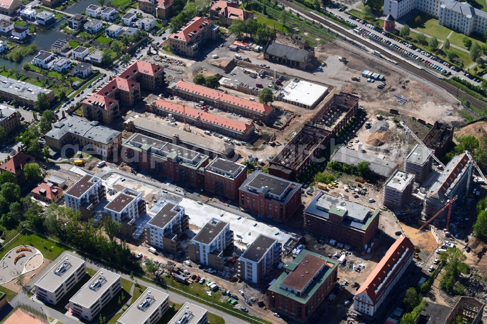 Leipzig from the bird's eye view: Construction site to build a new multi-family residential complex on the former Kasernengelaende on Olbrichtstrasse in Leipzig in the state Saxony, Germany