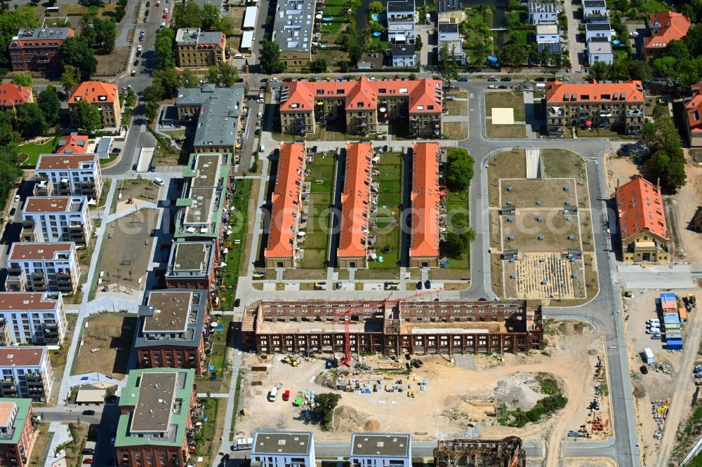 Leipzig from the bird's eye view: Construction site to build a new multi-family residential complex on the former Kasernengelaende on Olbrichtstrasse in Leipzig in the state Saxony, Germany