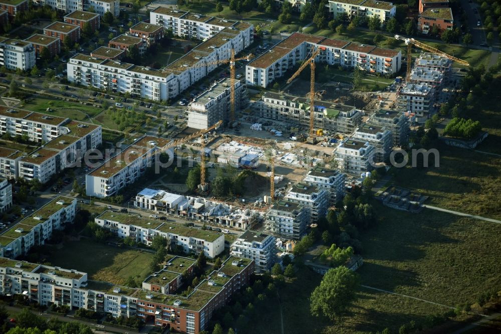 Berlin from above - Construction site to build a new multi-family residential complex Eisenacher Strasse - Hasenholzer Allee - Krummenseer Strasse in Berlin