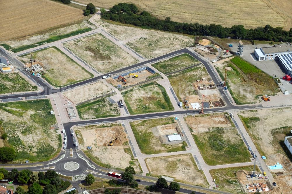 Aerial image Linkenheim-Hochstetten - Construction site to build a new multi-family residential complex along the Alten Landstrasse in Linkenheim-Hochstetten in the state Baden-Wurttemberg, Germany