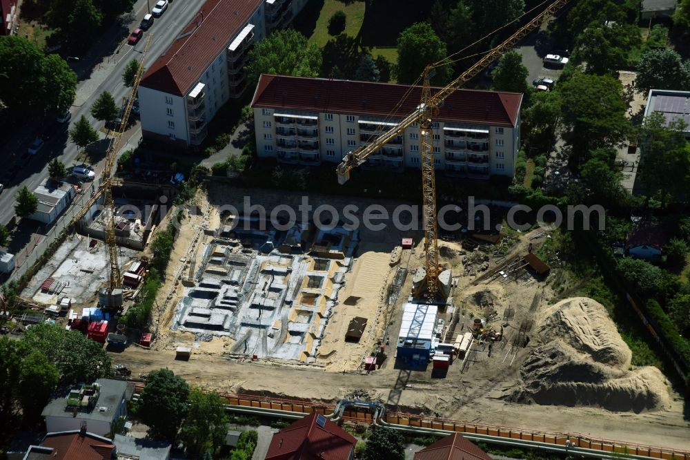 Berlin from the bird's eye view: Construction site to build a new multi-family residential complex along the Einbecker Strasse in Berlin, Germany