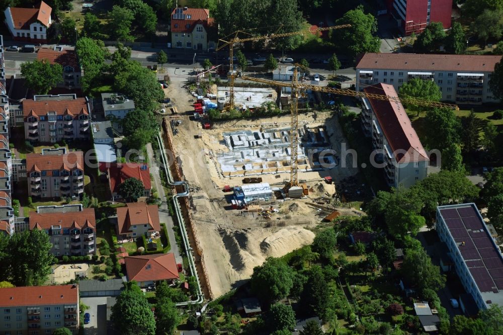 Berlin from the bird's eye view: Construction site to build a new multi-family residential complex along the Einbecker Strasse in Berlin, Germany