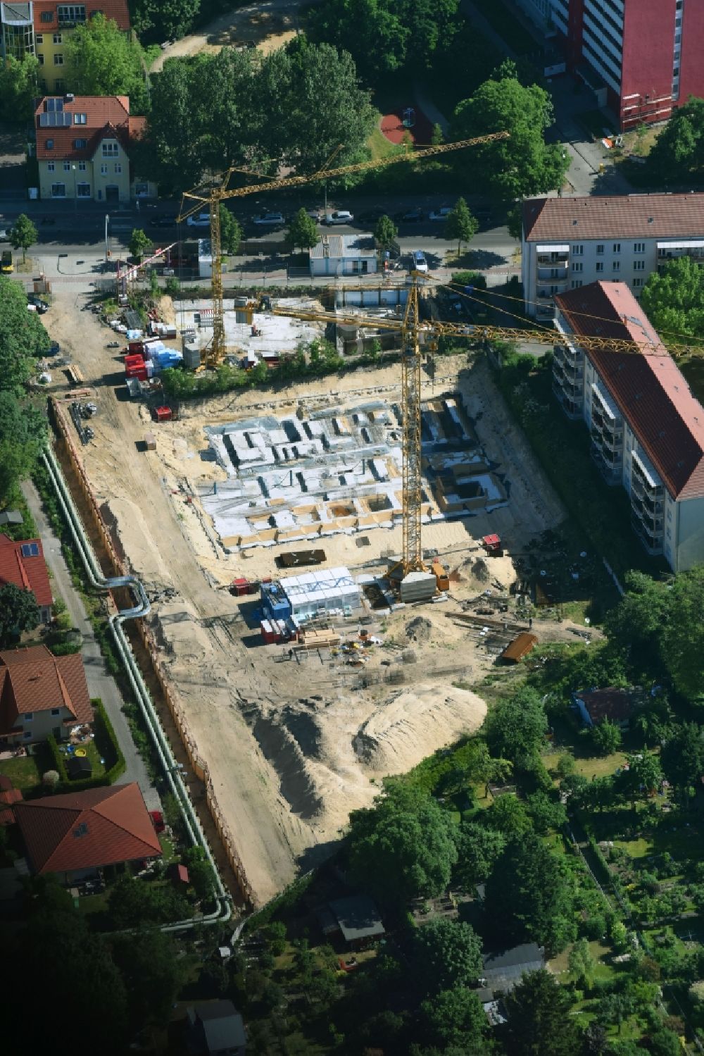 Aerial image Berlin - Construction site to build a new multi-family residential complex along the Einbecker Strasse in Berlin, Germany