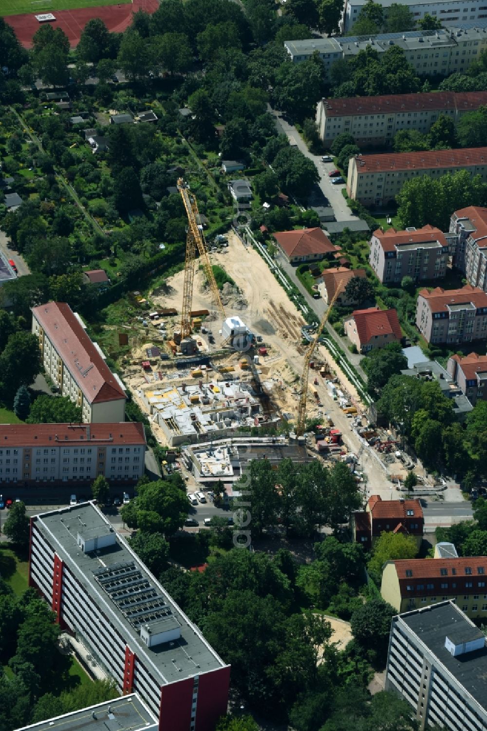 Aerial image Berlin - Construction site to build a new multi-family residential complex along the Einbecker Strasse in Berlin, Germany