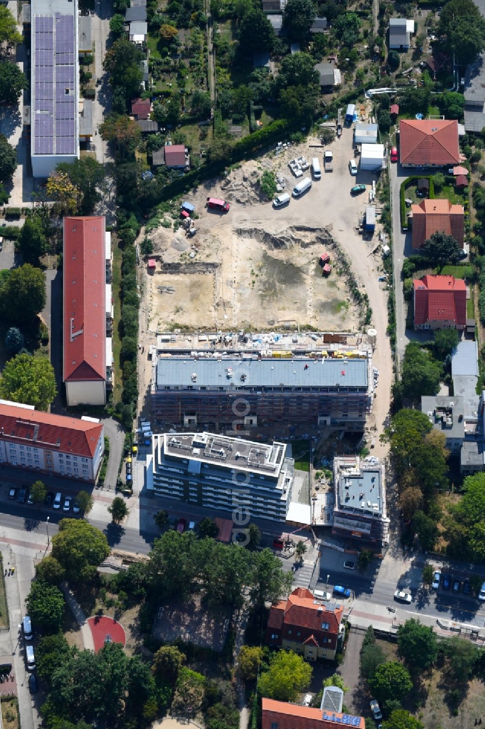 Berlin from the bird's eye view: Construction site to build a new multi-family residential complex along the Einbecker Strasse in Berlin, Germany