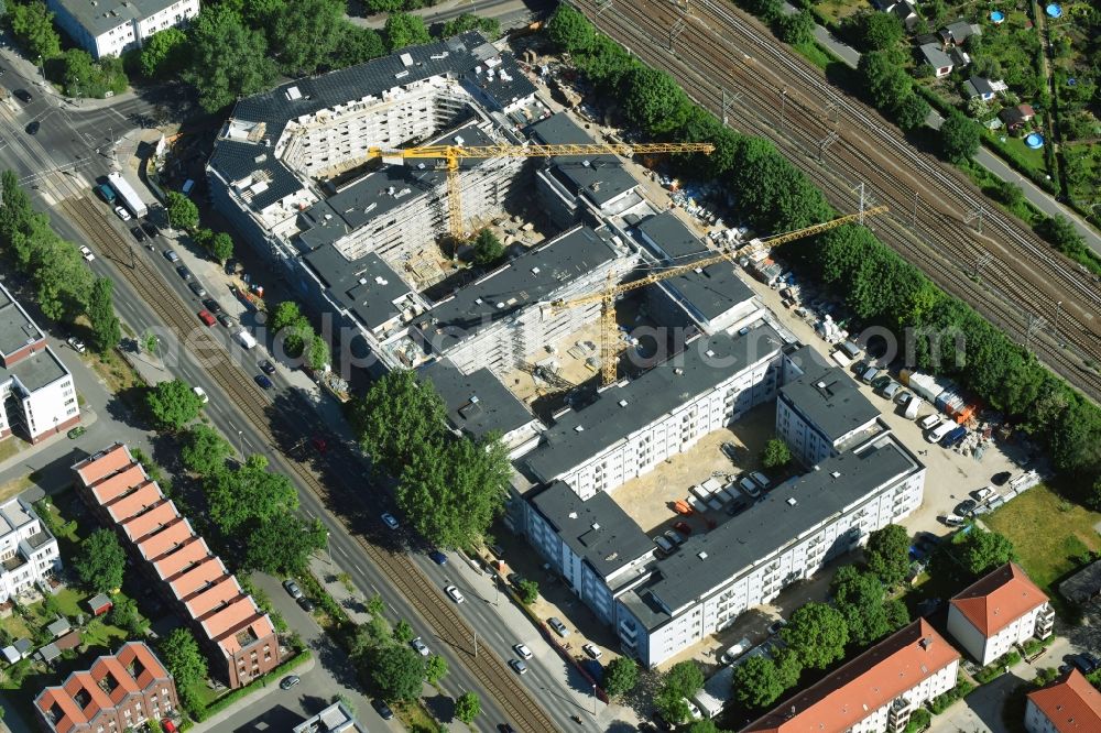 Berlin from above - Construction site to build a new multi-family residential complex along the Hauptstrasse on Rummelsburger Bucht in Rummelsburg in Berlin, Germany