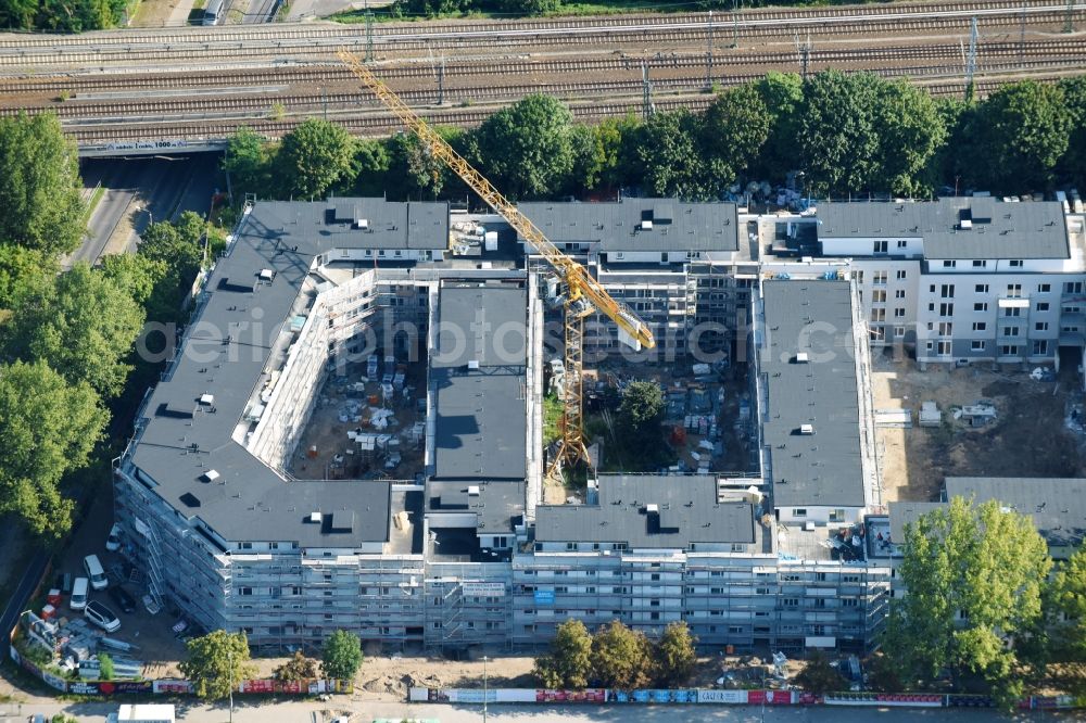 Aerial photograph Berlin - Construction site to build a new multi-family residential complex along the Hauptstrasse on Rummelsburger Bucht in Rummelsburg in Berlin, Germany