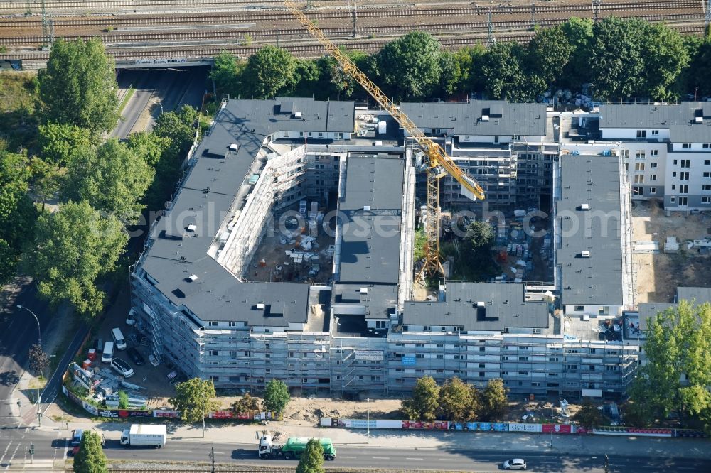 Berlin from above - Construction site to build a new multi-family residential complex along the Hauptstrasse on Rummelsburger Bucht in Rummelsburg in Berlin, Germany