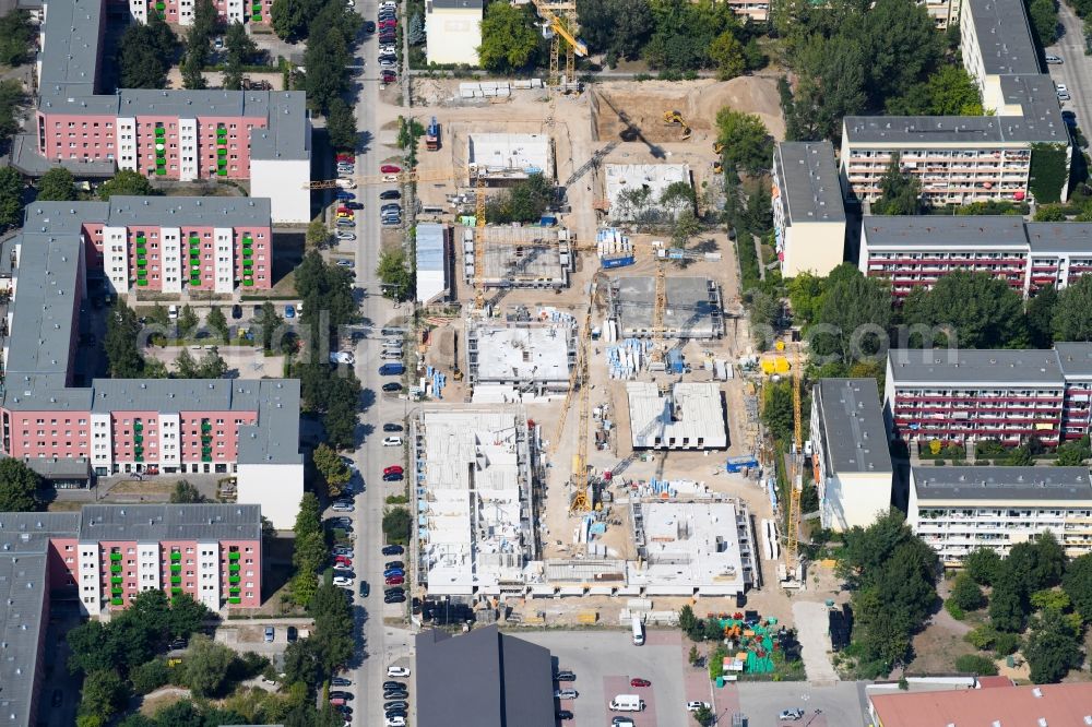 Berlin from above - Construction site to build a new multi-family residential complex along the Tangermuender Strasse in the district Hellersdorf in Berlin, Germany