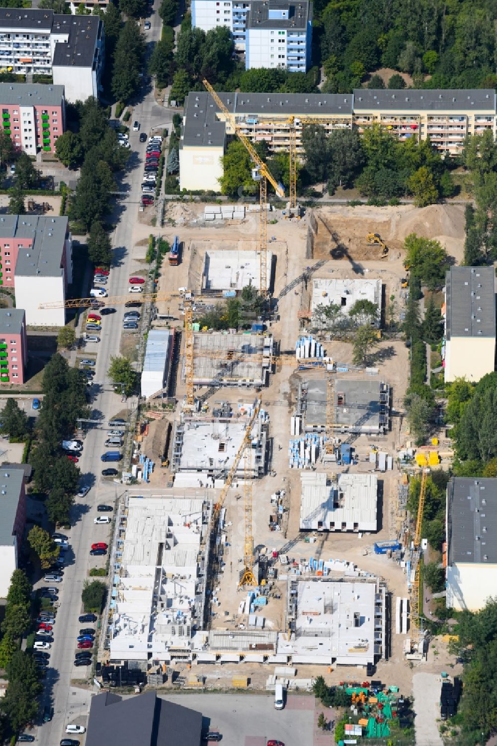 Aerial image Berlin - Construction site to build a new multi-family residential complex along the Tangermuender Strasse in the district Hellersdorf in Berlin, Germany