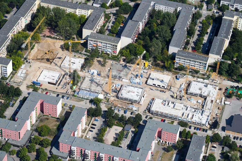 Berlin from the bird's eye view: Construction site to build a new multi-family residential complex along the Tangermuender Strasse in the district Hellersdorf in Berlin, Germany