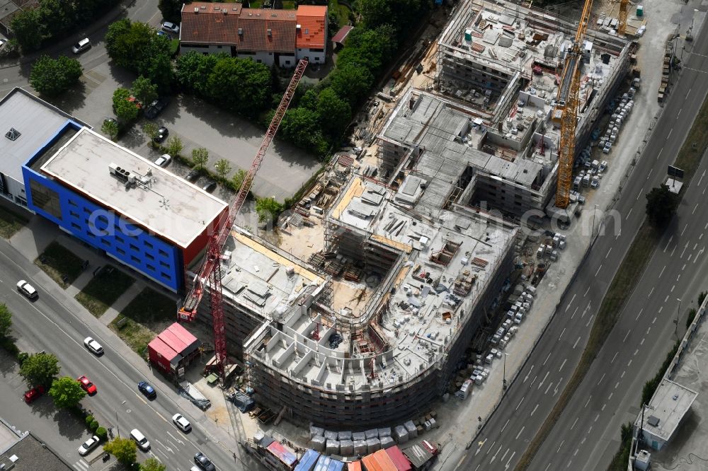 Ingolstadt from the bird's eye view: Construction site to build a new multi-family residential complex of Essinger Wohnbau GmbH on Theodor-Heuss-Strasse in Ingolstadt in the state Bavaria, Germany