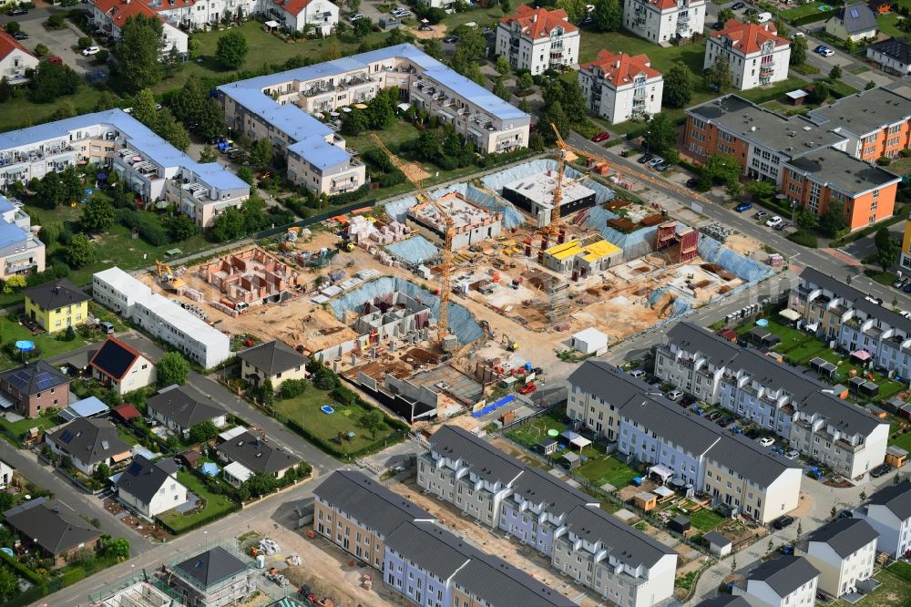 Michendorf from the bird's eye view: Construction site to build a new multi-family residential complex Falkenweg - Wieselweg - Hasenweg in Michendorf in the state Brandenburg, Germany