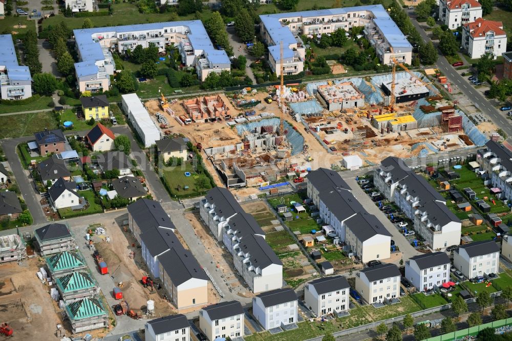 Michendorf from the bird's eye view: Construction site to build a new multi-family residential complex Falkenweg - Wieselweg - Hasenweg in Michendorf in the state Brandenburg, Germany