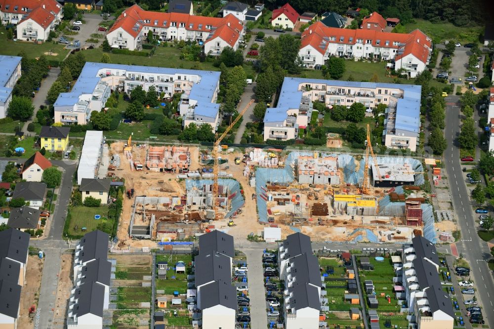 Michendorf from the bird's eye view: Construction site to build a new multi-family residential complex Falkenweg - Wieselweg - Hasenweg in Michendorf in the state Brandenburg, Germany