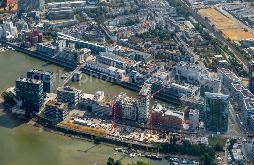 Düsseldorf from the bird's eye view: Construction site to build a new multi-family residential complex of FRANKONIA Eurobau AG on Speditionstrasse in Duesseldorf in the state North Rhine-Westphalia, Germany