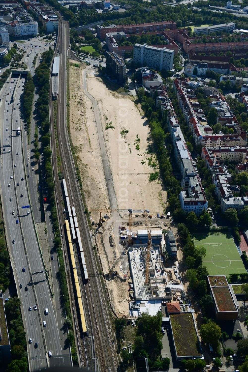 Berlin from the bird's eye view: Construction site to build a new multi-family residential complex Friedenauer Hoehe in the district Wilmersdorf in Berlin, Germany