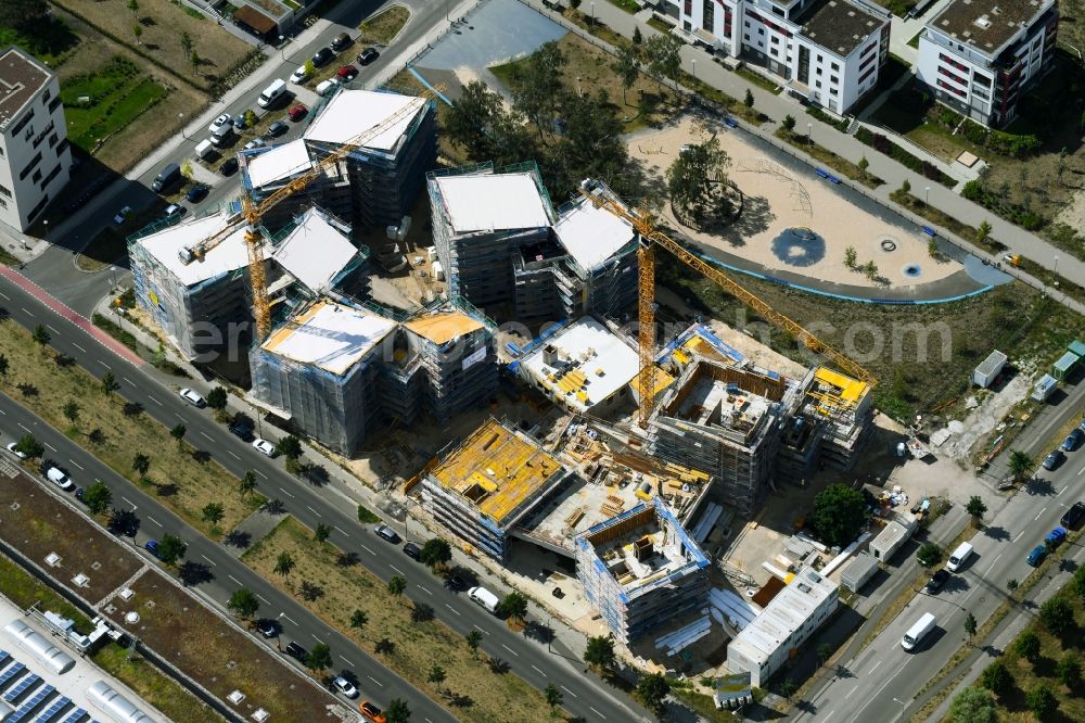 Berlin from the bird's eye view: Construction site to build a new multi-family residential complex Future Living Homes between Gross-Berliner Damm - Konrad-Zuse-Strasse and Hermann-Dorner-Allee in the district Adlershof - Johannisthal in Berlin, Germany