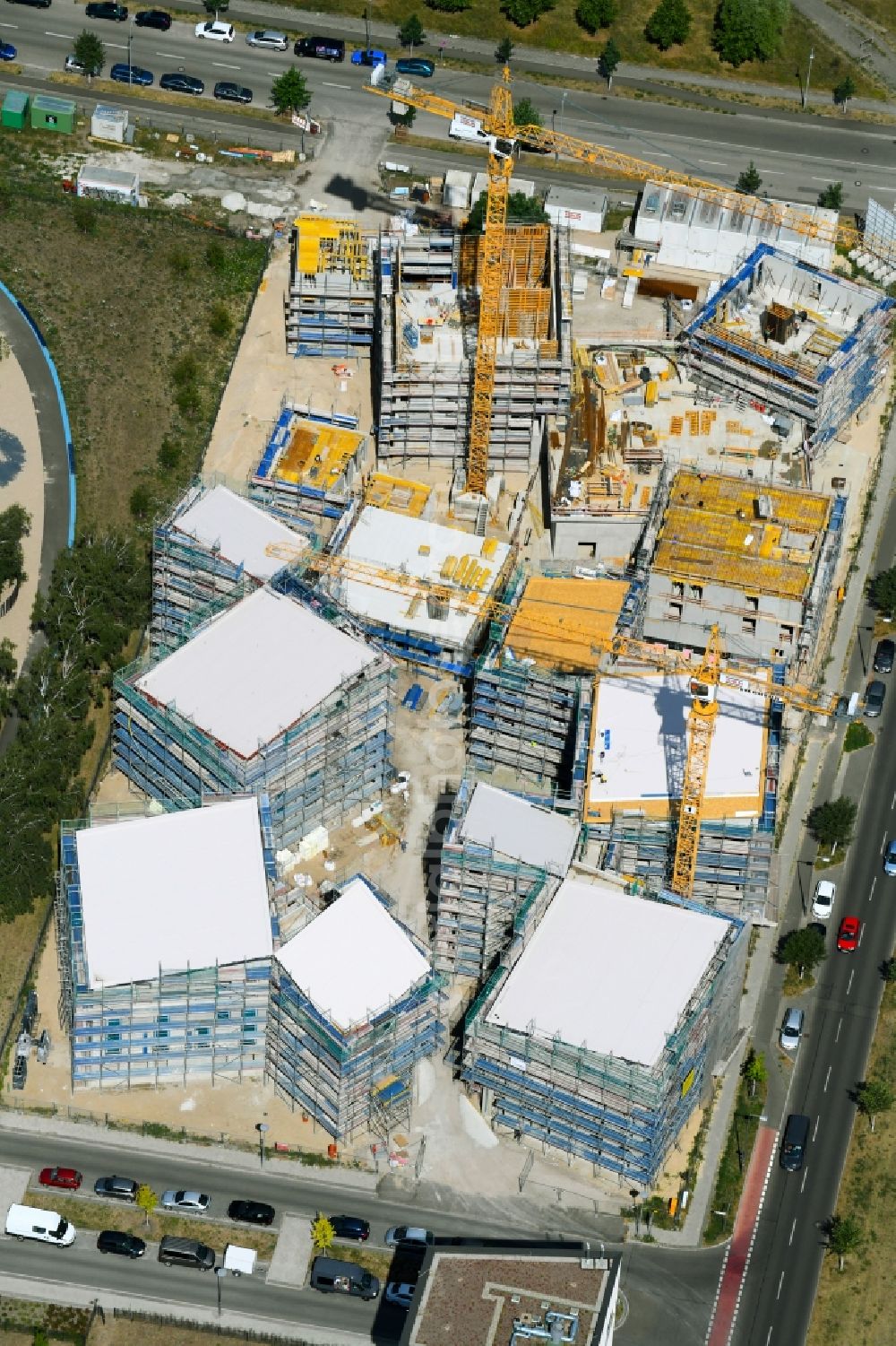 Berlin from the bird's eye view: Construction site to build a new multi-family residential complex Future Living Homes between Gross-Berliner Damm - Konrad-Zuse-Strasse and Hermann-Dorner-Allee in the district Adlershof - Johannisthal in Berlin, Germany