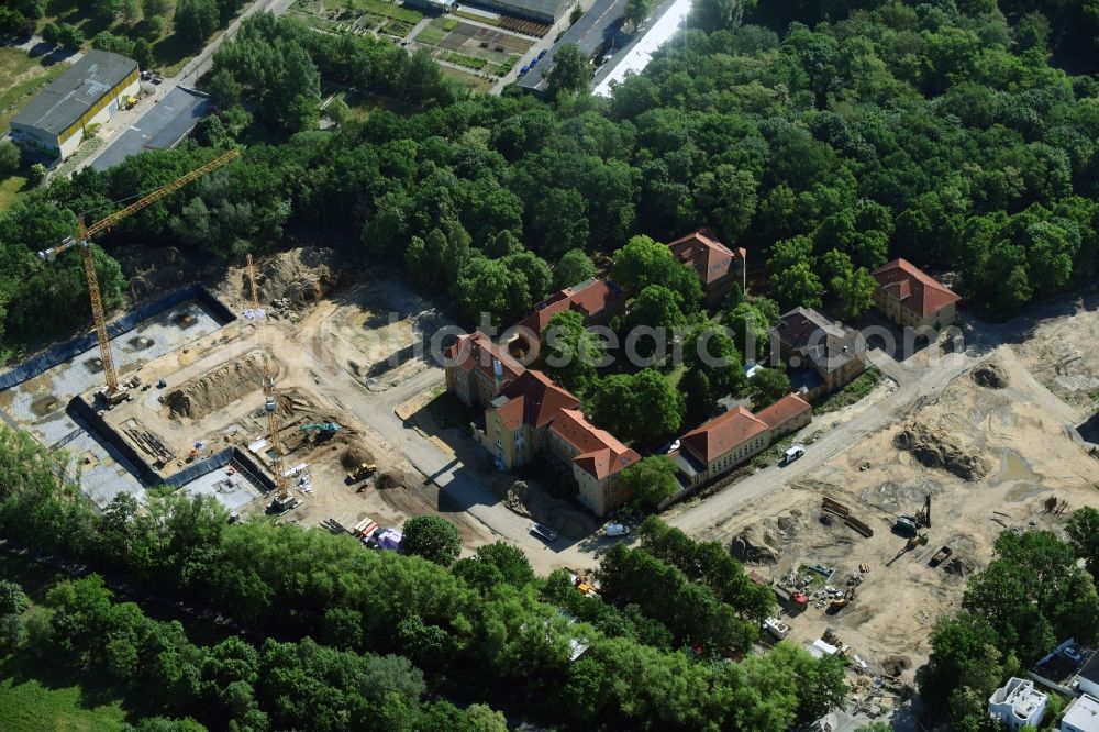 Berlin from above - Construction site for the construction of a multi-family house residential complex on the grounds of the former Kinderklinik Lindenhof on the Gotlindestrasse in the district of Lichtenberg in Berlin, Germany