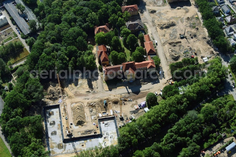 Berlin from above - Construction site for the construction of a multi-family house residential complex on the grounds of the former Kinderklinik Lindenhof on the Gotlindestrasse in the district of Lichtenberg in Berlin, Germany