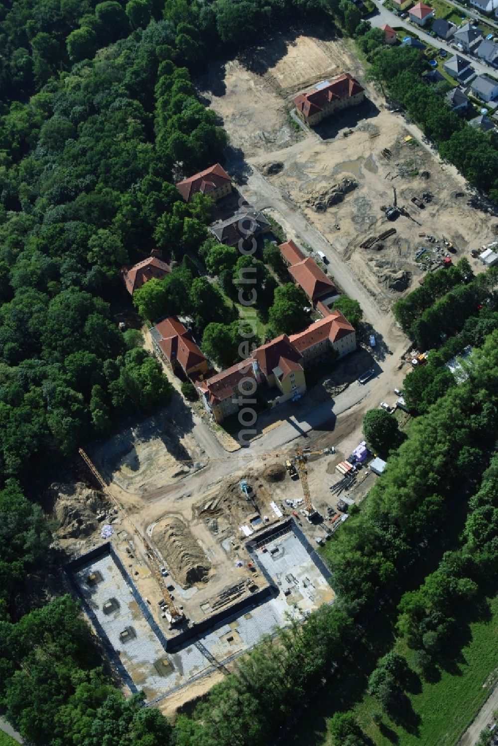 Berlin from the bird's eye view: Construction site for the construction of a multi-family house residential complex on the grounds of the former Kinderklinik Lindenhof on the Gotlindestrasse in the district of Lichtenberg in Berlin, Germany