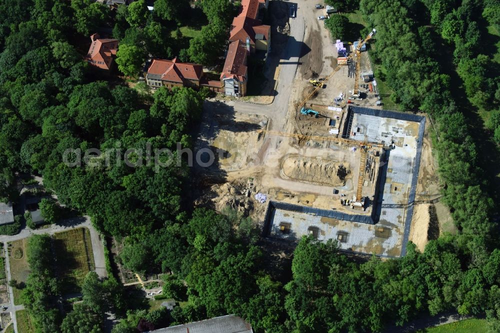 Berlin from above - Construction site for the construction of a multi-family house residential complex on the grounds of the former Kinderklinik Lindenhof on the Gotlindestrasse in the district of Lichtenberg in Berlin, Germany