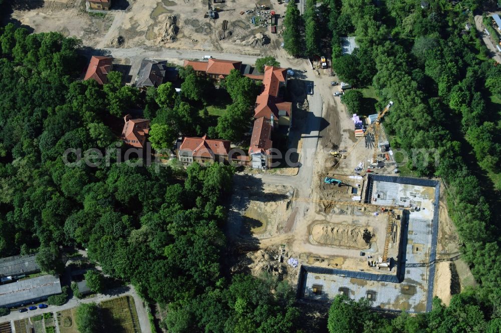 Berlin from the bird's eye view: Construction site for the construction of a multi-family house residential complex on the grounds of the former Kinderklinik Lindenhof on the Gotlindestrasse in the district of Lichtenberg in Berlin, Germany