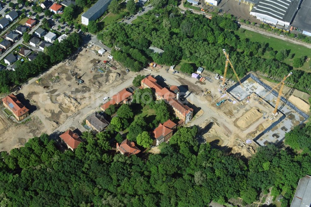 Berlin from the bird's eye view: Construction site for the construction of a multi-family house residential complex on the grounds of the former Kinderklinik Lindenhof on the Gotlindestrasse in the district of Lichtenberg in Berlin, Germany