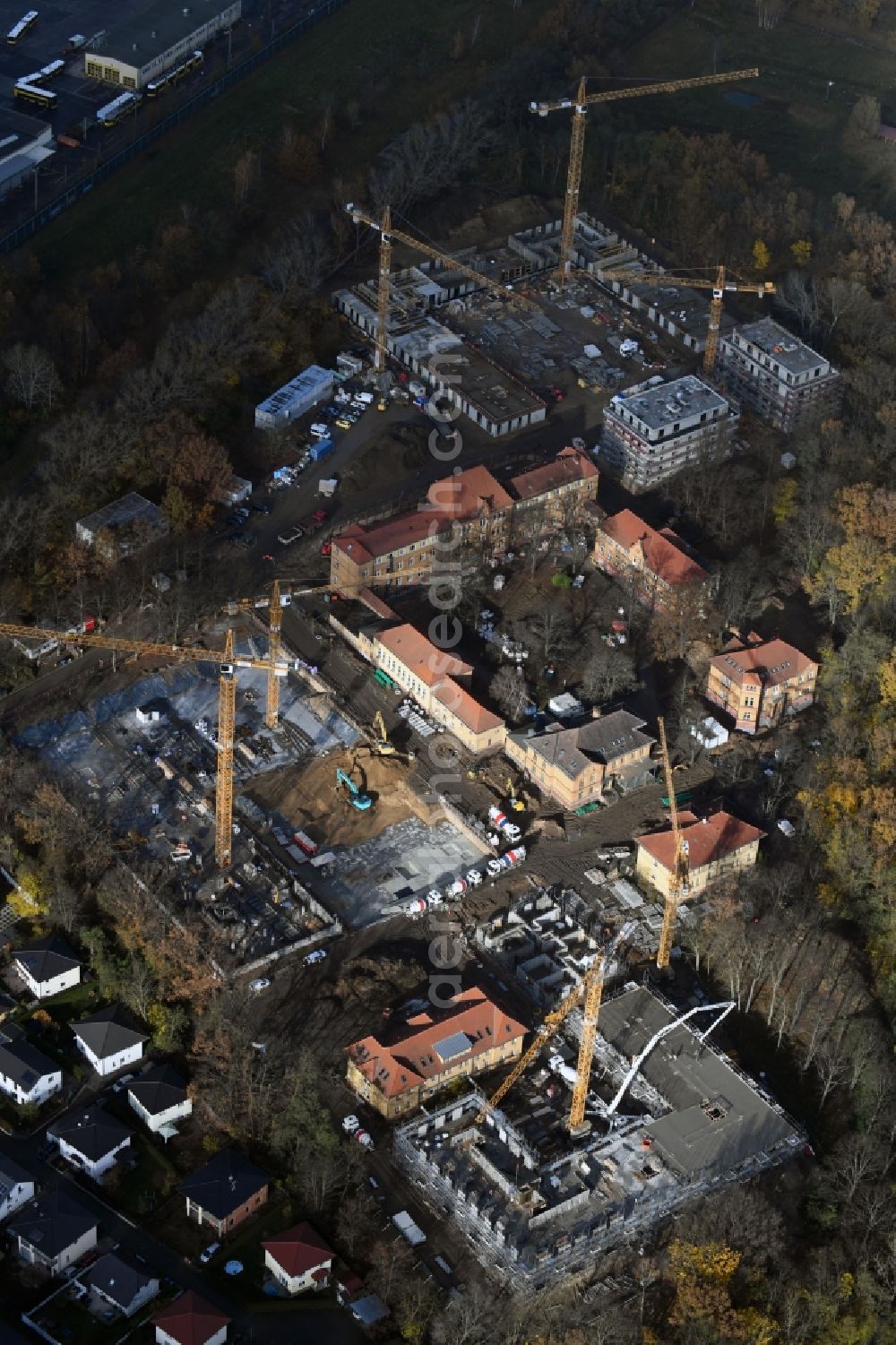 Berlin from the bird's eye view: Construction site for the construction of a multi-family house residential complex on the grounds of the former Kinderklinik Lindenhof on the Gotlindestrasse in the district of Lichtenberg in Berlin, Germany