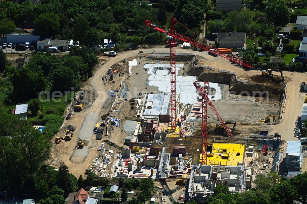 Berlin from the bird's eye view: Construction site to build a new multi-family residential complex Germanenstrasse - Gruenauer Strasse in the district Altglienicke in Berlin, Germany