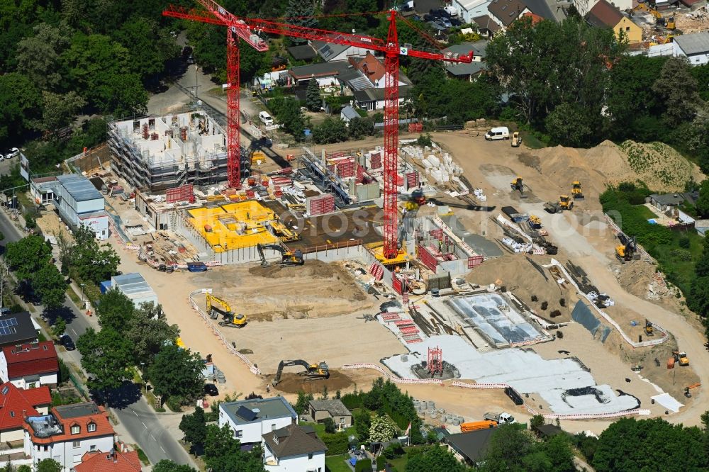 Berlin from the bird's eye view: Construction site to build a new multi-family residential complex Germanenstrasse - Gruenauer Strasse in the district Altglienicke in Berlin, Germany