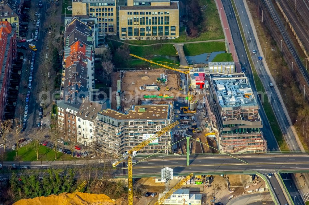 Düsseldorf from above - Construction site to build a new multi-family residential complex with commercial areas on Juelicher Bruecke and Yorckstrasse in Duesseldorf in the state of North Rhine-Westphalia