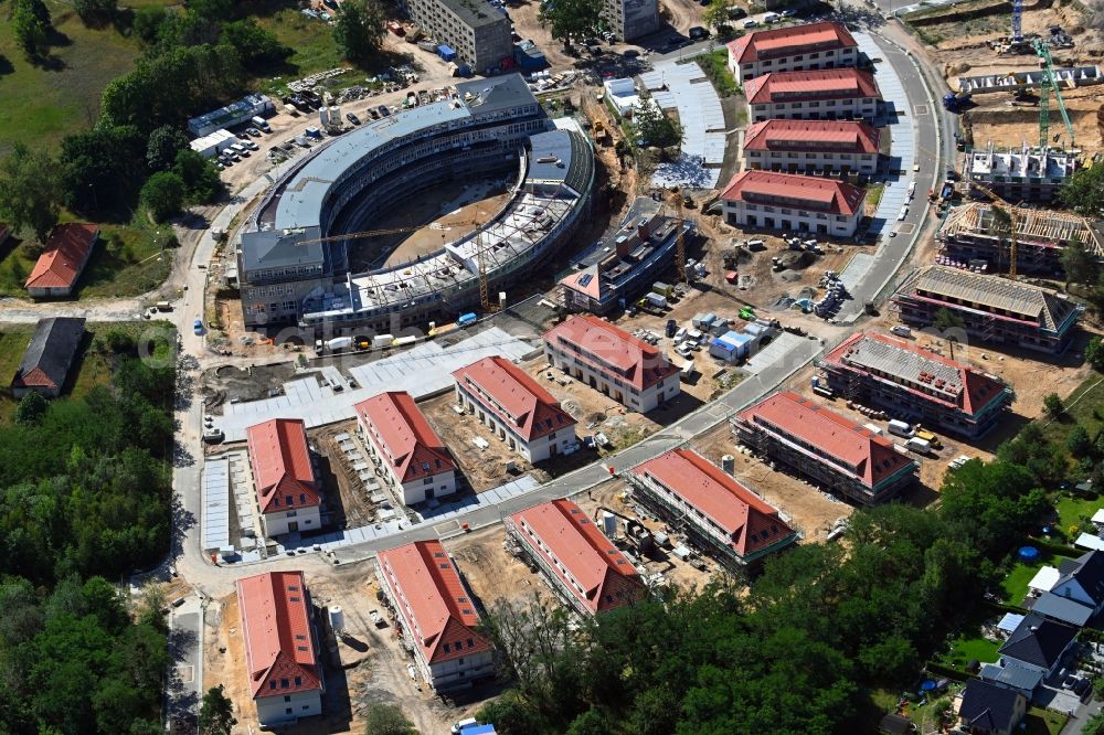 Aerial image Wustermark - Construction site to build a new multi-family residential complex Gold- Gartenstadt Olympisches Dorf von 1936 in the district Elstal in Wustermark in the state Brandenburg, Germany