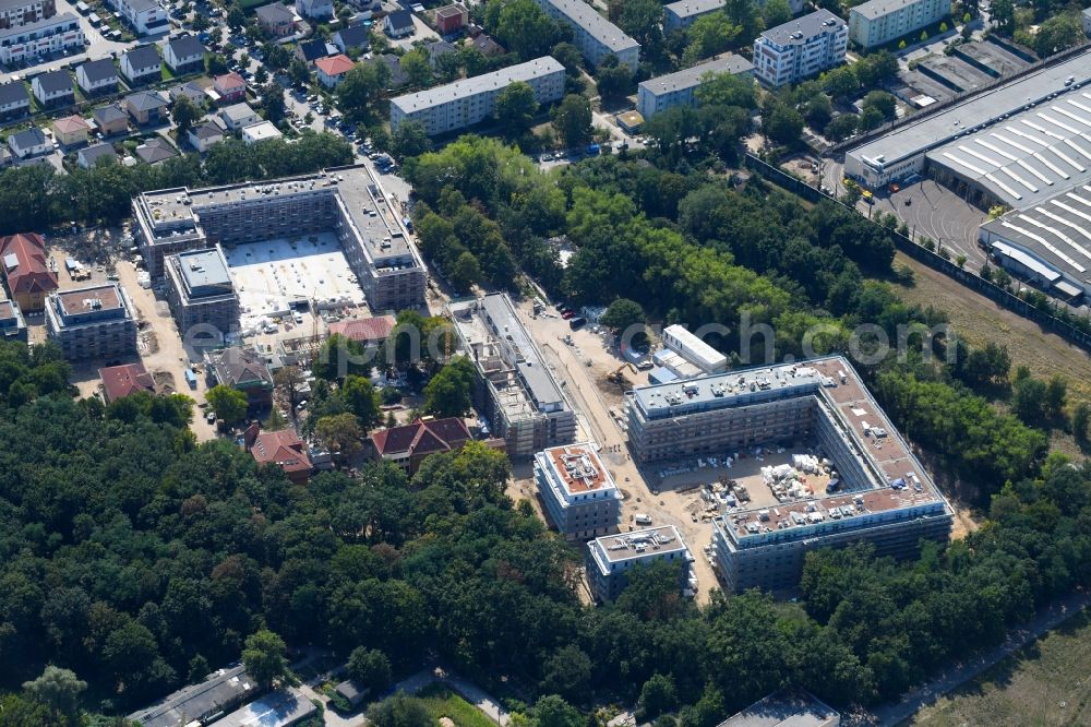 Berlin from the bird's eye view: Construction site for the construction of a multi-family house residential complex on the grounds of the former Kinderklinik Lindenhof on the Gotlindestrasse in the district of Lichtenberg in Berlin, Germany