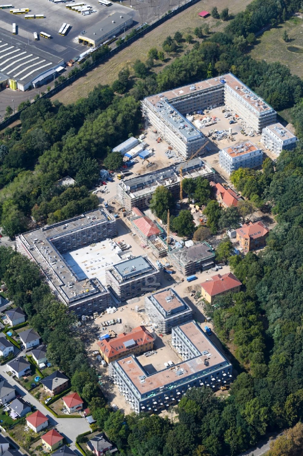 Berlin from above - Construction site for the construction of a multi-family house residential complex on the grounds of the former Kinderklinik Lindenhof on the Gotlindestrasse in the district of Lichtenberg in Berlin, Germany