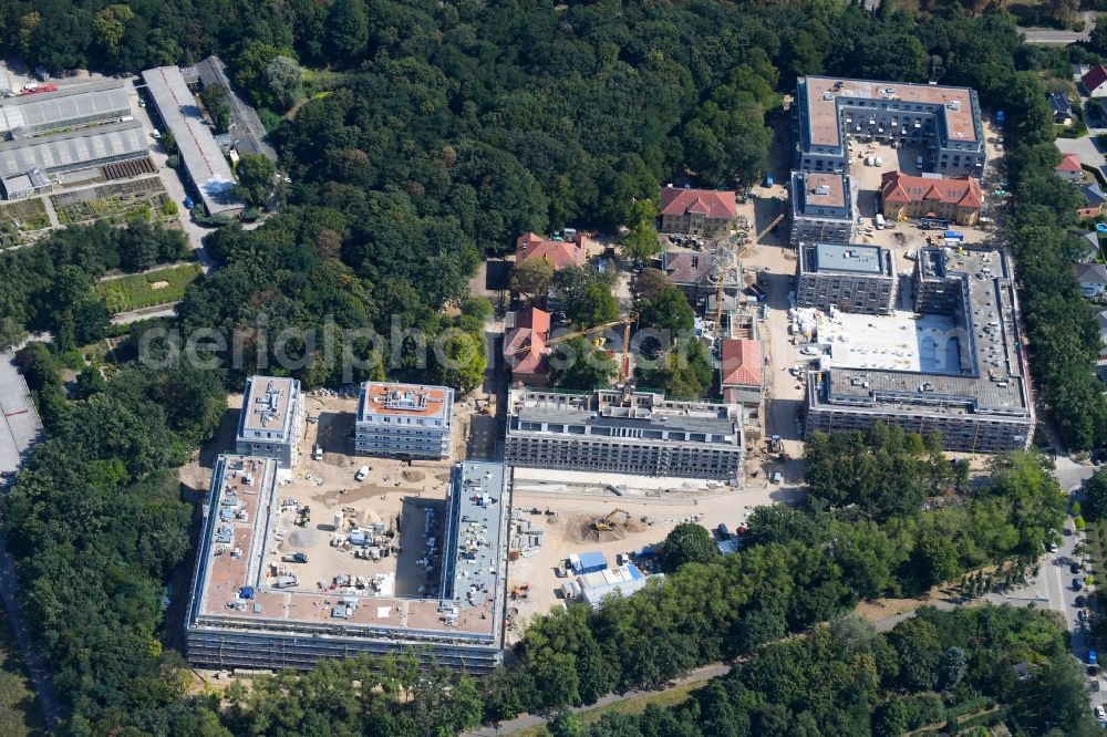 Berlin from above - Construction site for the construction of a multi-family house residential complex on the grounds of the former Kinderklinik Lindenhof on the Gotlindestrasse in the district of Lichtenberg in Berlin, Germany