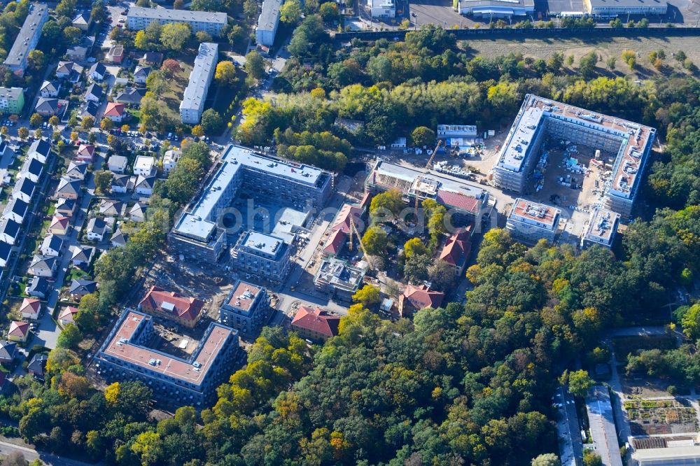 Berlin from the bird's eye view: Construction site for the construction of a multi-family house residential complex on the grounds of the former Kinderklinik Lindenhof on the Gotlindestrasse in the district of Lichtenberg in Berlin, Germany